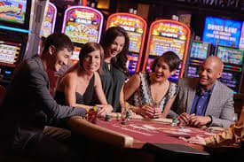 Live blackjack table at Diamond Empire studio with dealer and multiple player seats