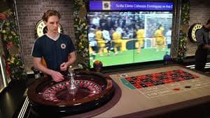 Baccarat live table layout with Player, Banker, and Tie betting circles